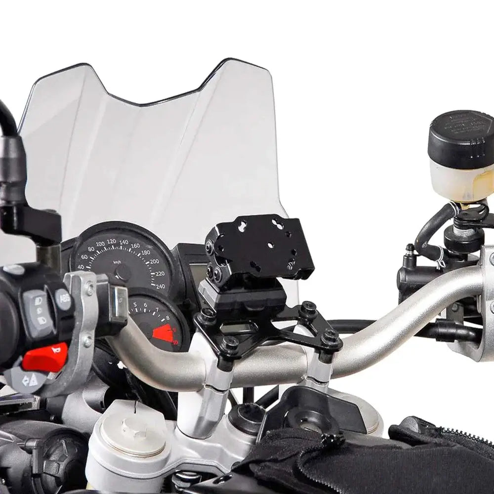 KTM 990 Adventure phone holder mounted on motorcycle handlebars for easy device access.