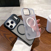 Magneettinen puhelinkuori iPhone in two stylish designs held in hand on a wooden table.
