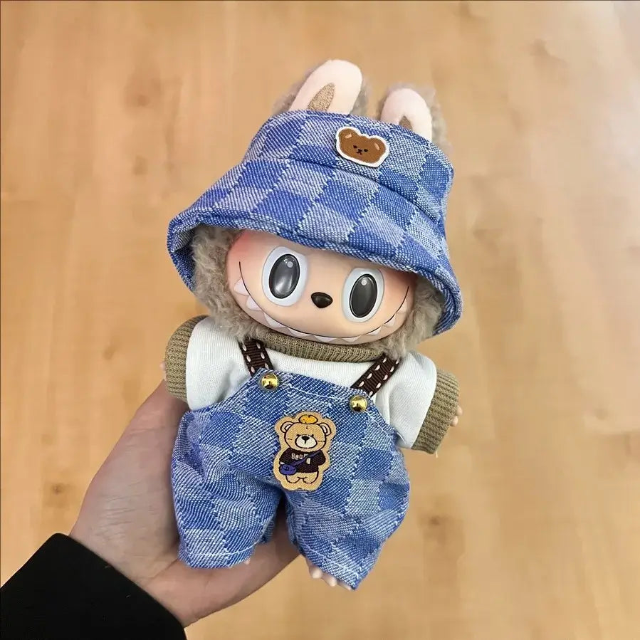 Labubu doll clothes 17cm featuring a doll in blue checkered overalls and hat, perfect for kids and collectors.