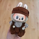 Cute Labubu doll dressed in brown casual overalls with a striped shirt and bunny ears, showcasing Labubu doll clothes 17cm.