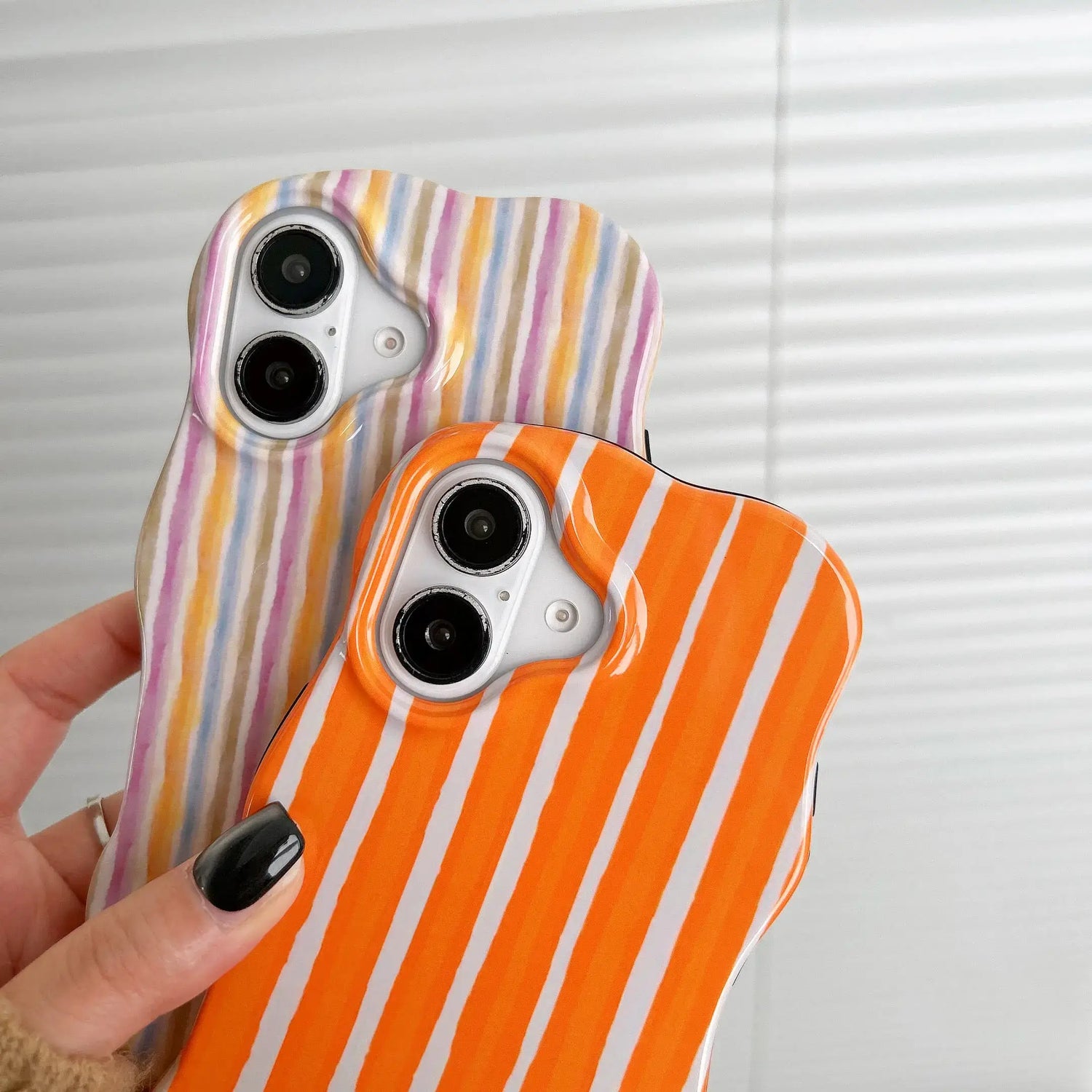 iPhone 2-in-1 striped phone case featuring colorful striped designs and a snug fit for your phone.