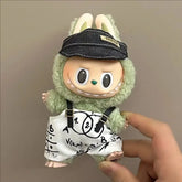 Labubu doll clothes 17cm on a cute green character wearing a black cap and math-themed shorts.