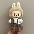 Labubu doll clothes 17cm on a cute doll with rabbit ears wearing a fluffy hood and plaid dress.