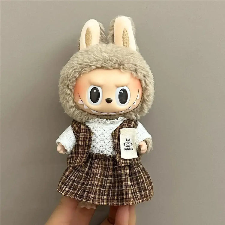 Labubu doll clothes 17cm on a cute doll with rabbit ears wearing a fluffy hood and plaid dress.