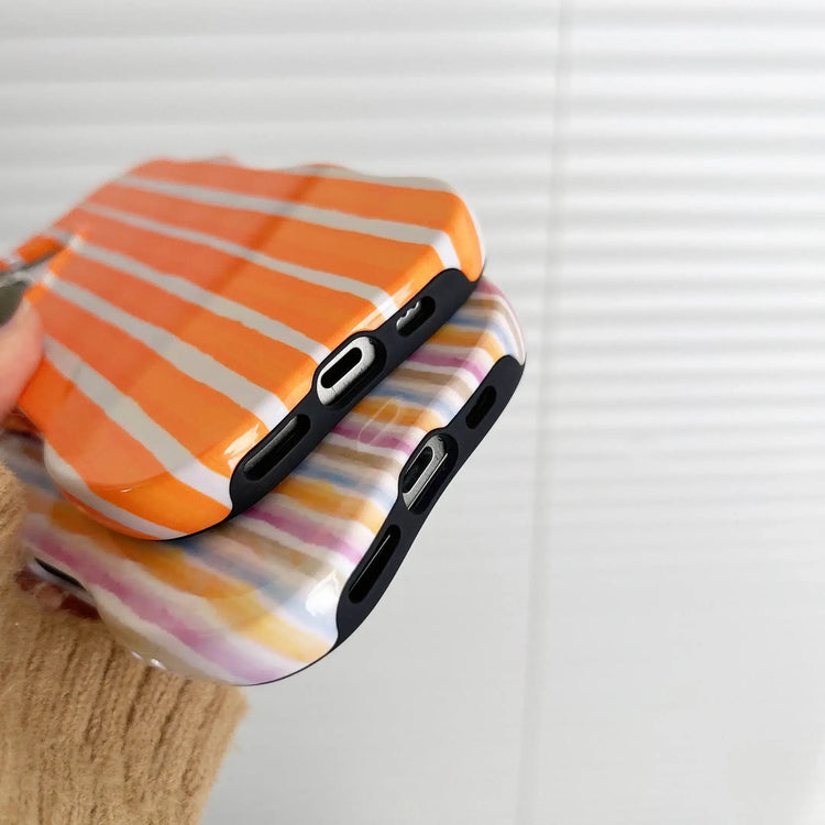 iPhone 2-in-1 striped phone case showcasing vibrant striped design and charging ports.