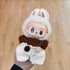 Labubu doll clothes 17cm styled on a doll wearing a cute bunny outfit with fluffy ears and striped pants.