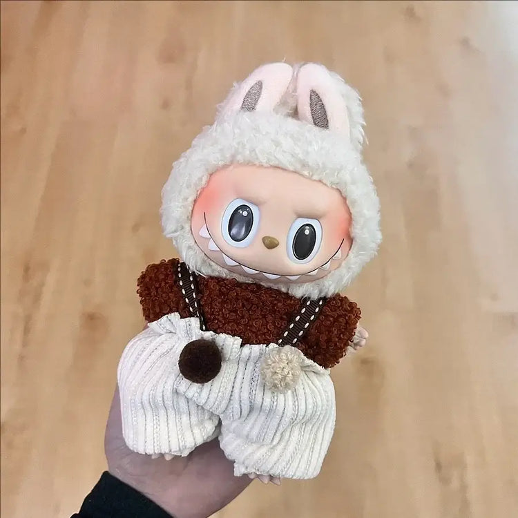 Labubu doll clothes 17cm styled on a doll wearing a cute bunny outfit with fluffy ears and striped pants.