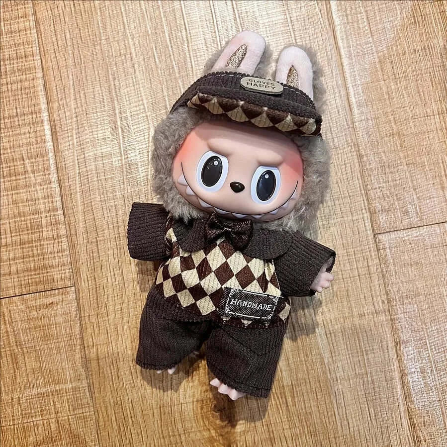 Labubu doll clothes 17cm on a cute doll wearing a stylish casual outfit with bunny ears and a checkered design.