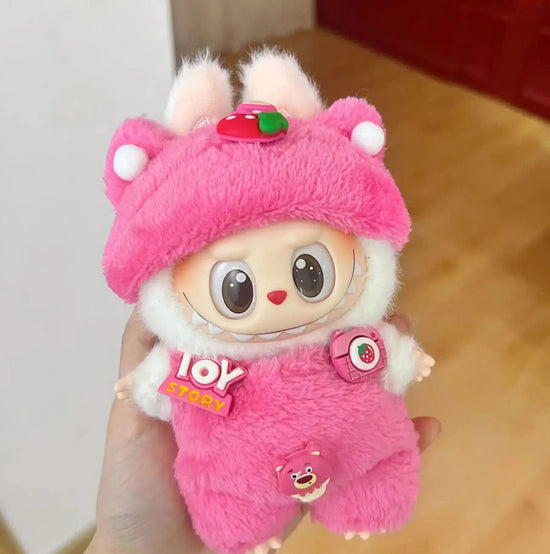 Labubu doll clothes 17cm on a cute pink doll featuring bunny ears and a cheerful expression.