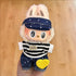 Labubu doll clothes 17cm on a cute doll wearing a striped shirt and blue jeans with a cap and bunny ears.