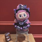 Labubu doll clothes 17cm on a cute doll in a stylish outfit with a fluffy design and colorful details.