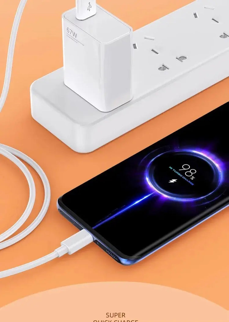 67W USB fast charger for smartphones connected to a sleek smartphone, showcasing fast charging capabilities.